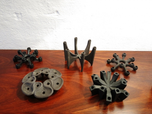 Selection of Mid Century Modern cast iron candleholders