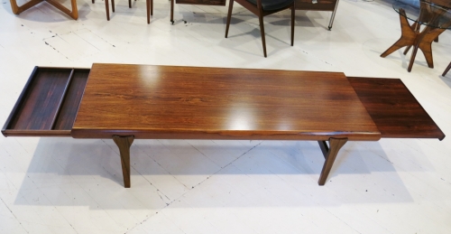 Danish coffee table with concealed end drawer and leaf end