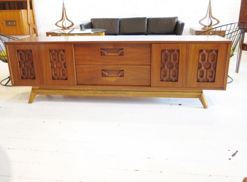 Low American Mid-Century carved front sideboard