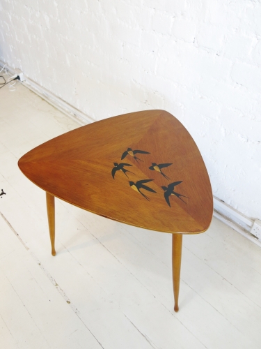 Triangular side table with wood inlay of birds