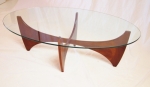 Oval coffee table
with new toughen glass top
Fully restored timber base
circa: 1960
Origin : UK
