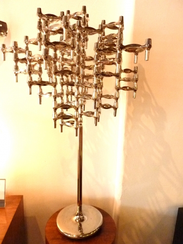 Candle sculpture on tall floor stand