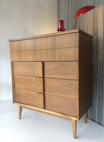 Sculptural American Mid Century Walnut chest of drawers.